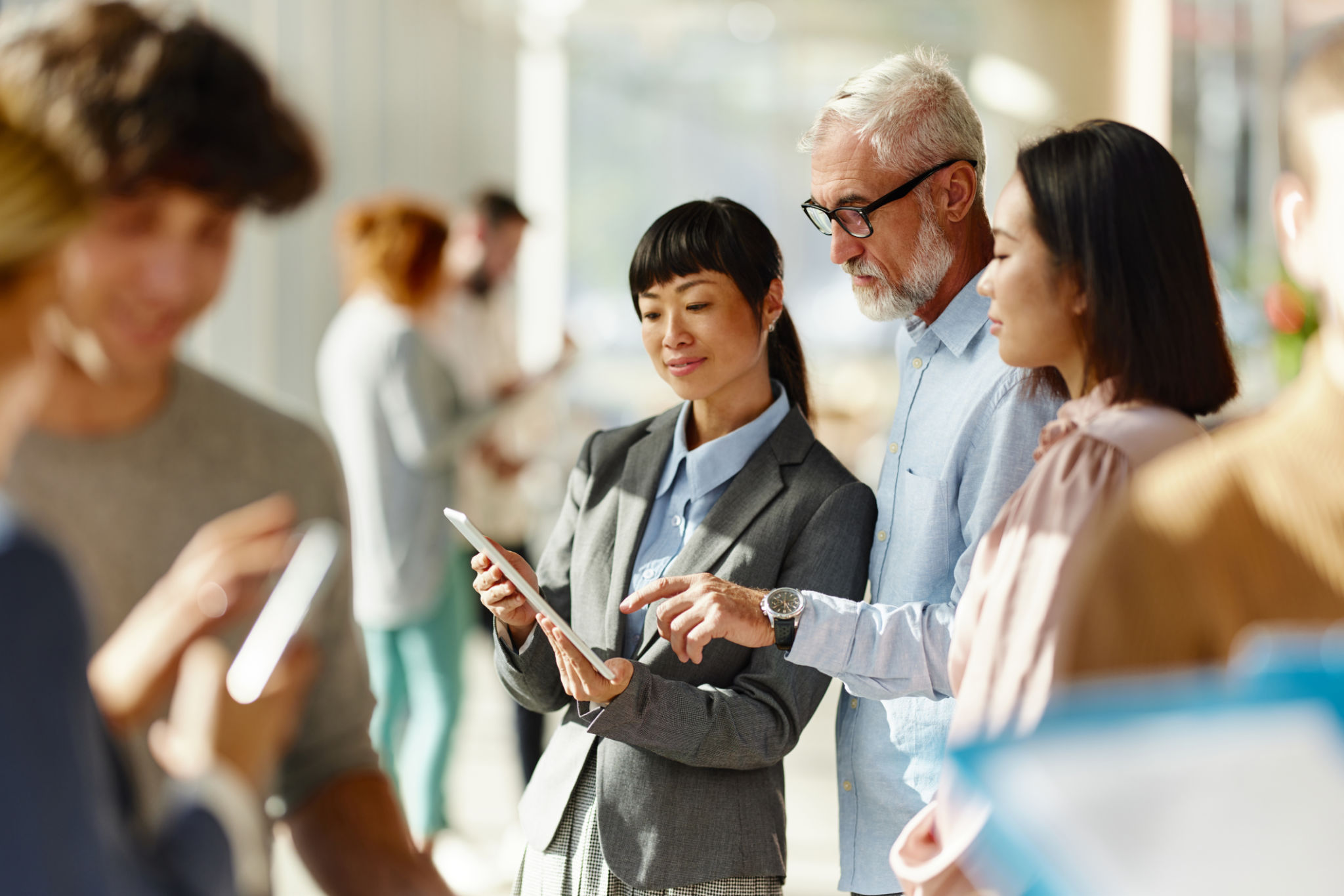 Diverse team collaborating in modern office