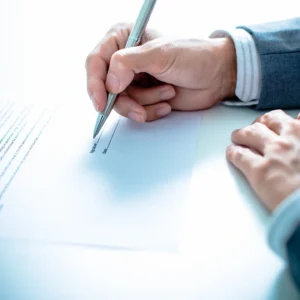 Signing a document with a pen