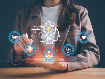 Businesswoman interacting with futuristic AI technology icons.