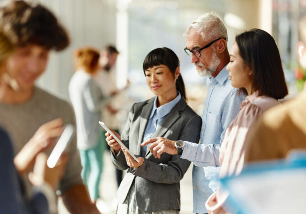 Diverse team collaborating in modern office